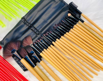 24-piece professional makeup brush set in a leather roll-up pouch