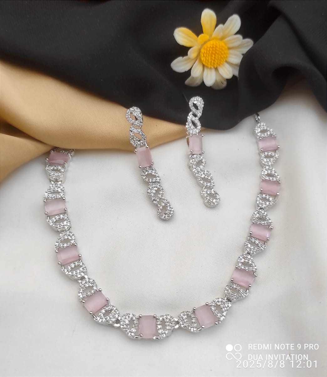 Necklace and Matching Earrings Adorned With Stones and Clear Cubic Zirconia.