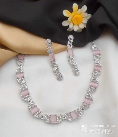 Necklace and Matching Earrings Adorned With Stones and Clear Cubic Zirconia.