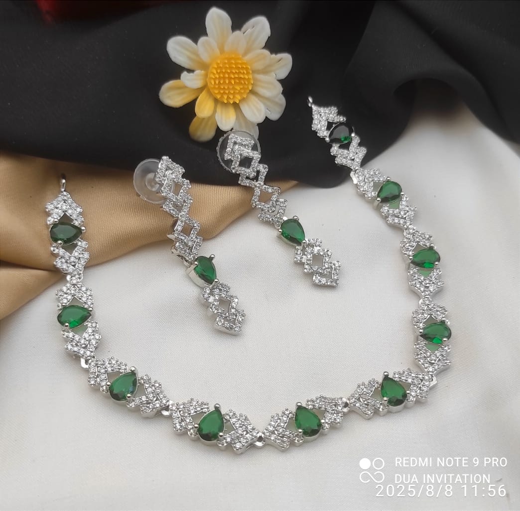 Necklace and Matching Earrings Adorned With Stones and Clear Cubic Zirconia.