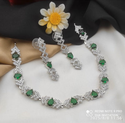 Necklace and Matching Earrings Adorned With Stones and Clear Cubic Zirconia.