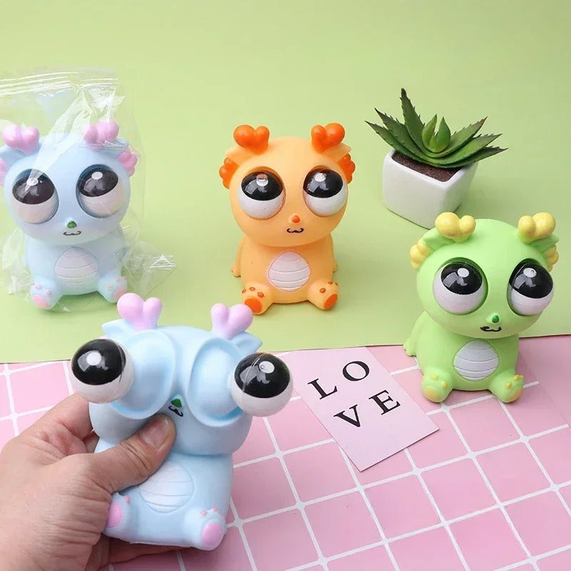 1 Piece Creative Explosive Eye Popping Dragon kids Rubber Toy 
Random Colours