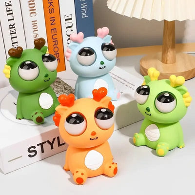 1 Piece Creative Explosive Eye Popping Dragon kids Rubber Toy 
Random Colours