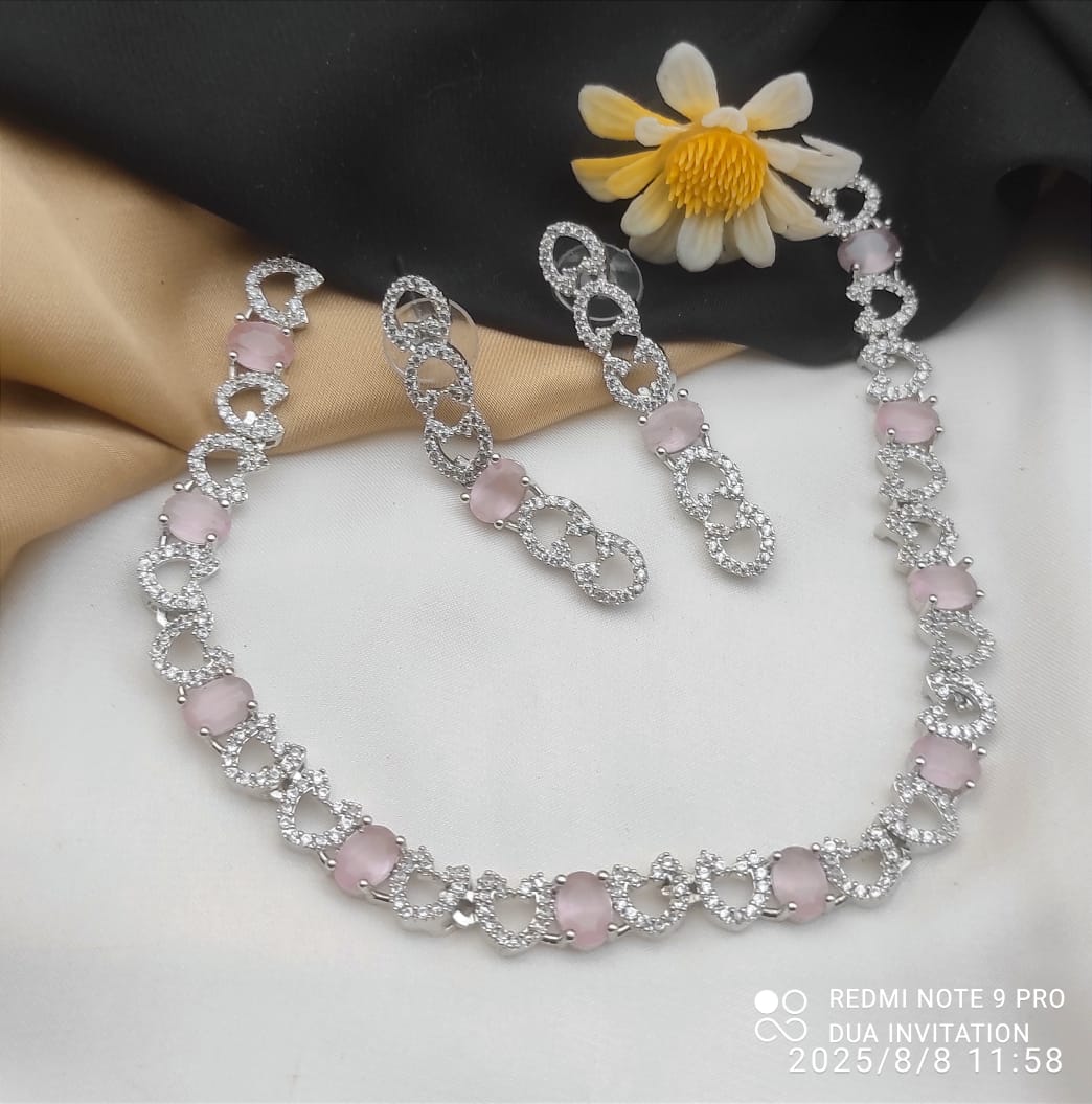 Necklace and Matching Earrings Adorned With Stones and Clear Cubic Zirconia.
