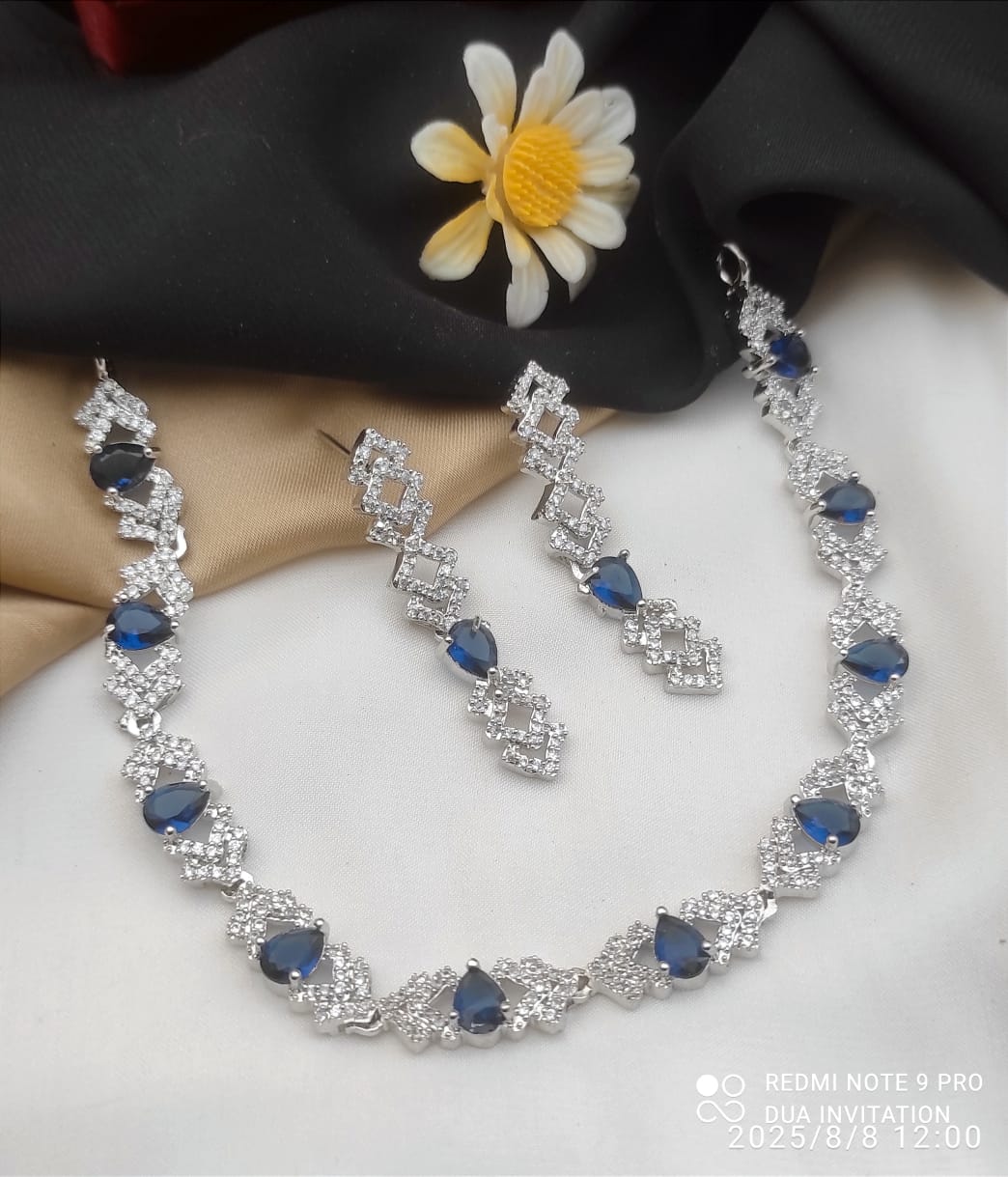 Necklace and Matching Earrings Adorned With Stones and Clear Cubic Zirconia.