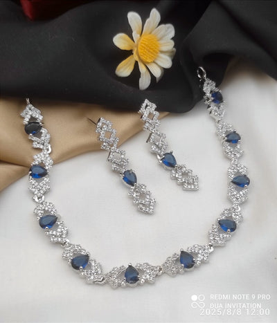 Necklace and Matching Earrings Adorned With Stones and Clear Cubic Zirconia.
