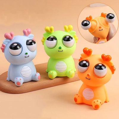 1 Piece Creative Explosive Eye Popping Dragon kids Rubber Toy 
Random Colours